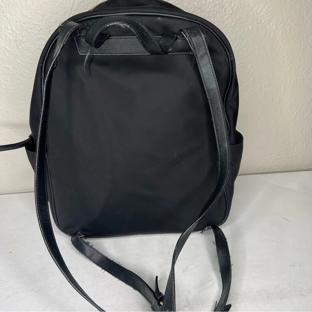 Kate Spade black gold zippers back pack
